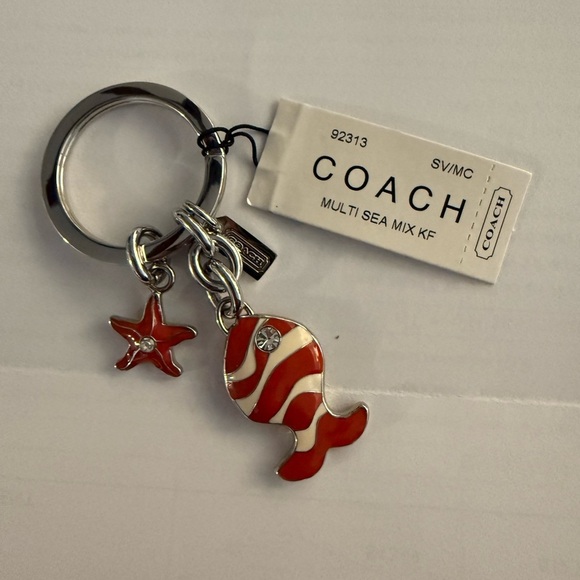 Coach Accessories - Vintage Coach Silver and Orange fish and star Keychain nwt